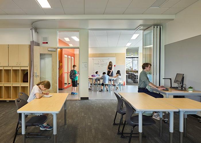 classroom with large open door to learning commons